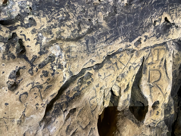 Witch marks are protective symbols that have been carved into limestone caves.